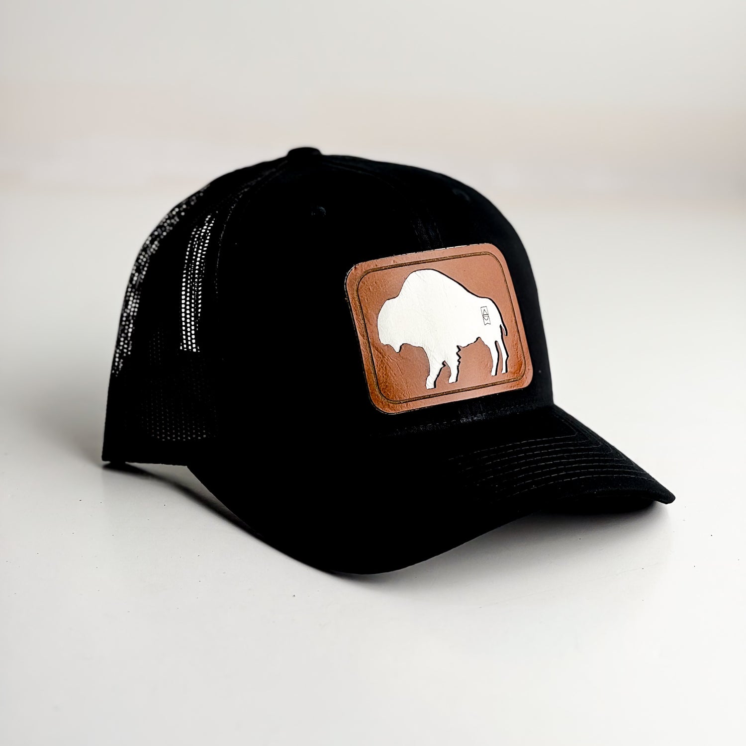 Bison Trucker Hat | Black + Whiskey