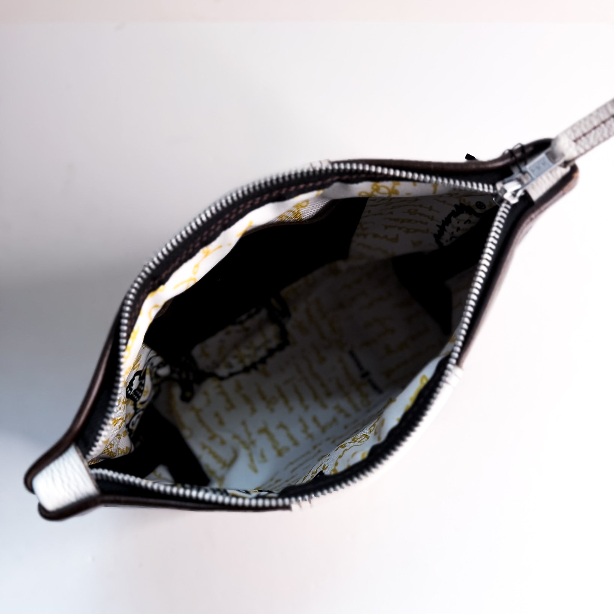 Steamboat Collection | Carry More Clutch | Rocky + White Pebble