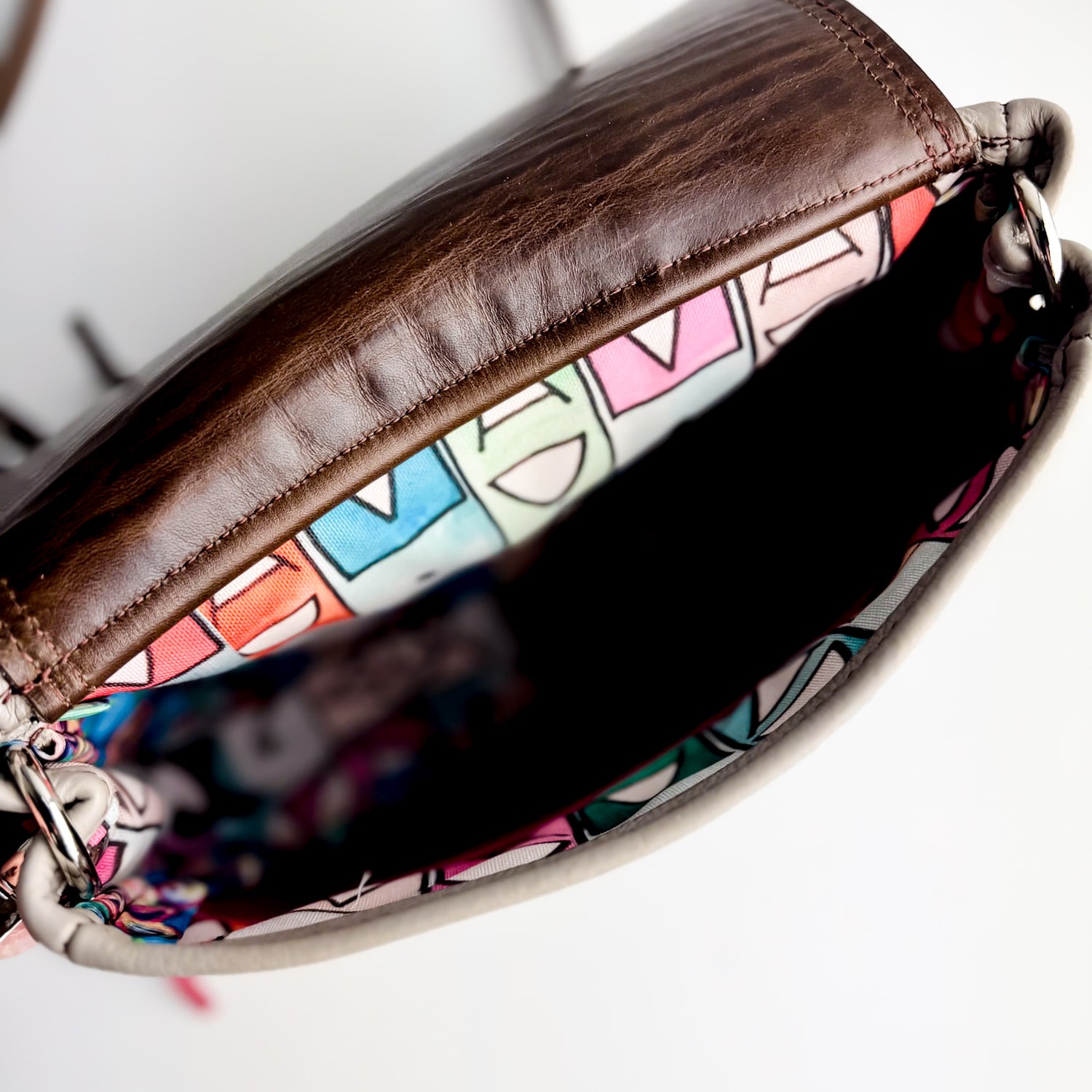 Arena Tradition Collection | Mini E Crossbody | Hair-on-Hide + Stone Gray