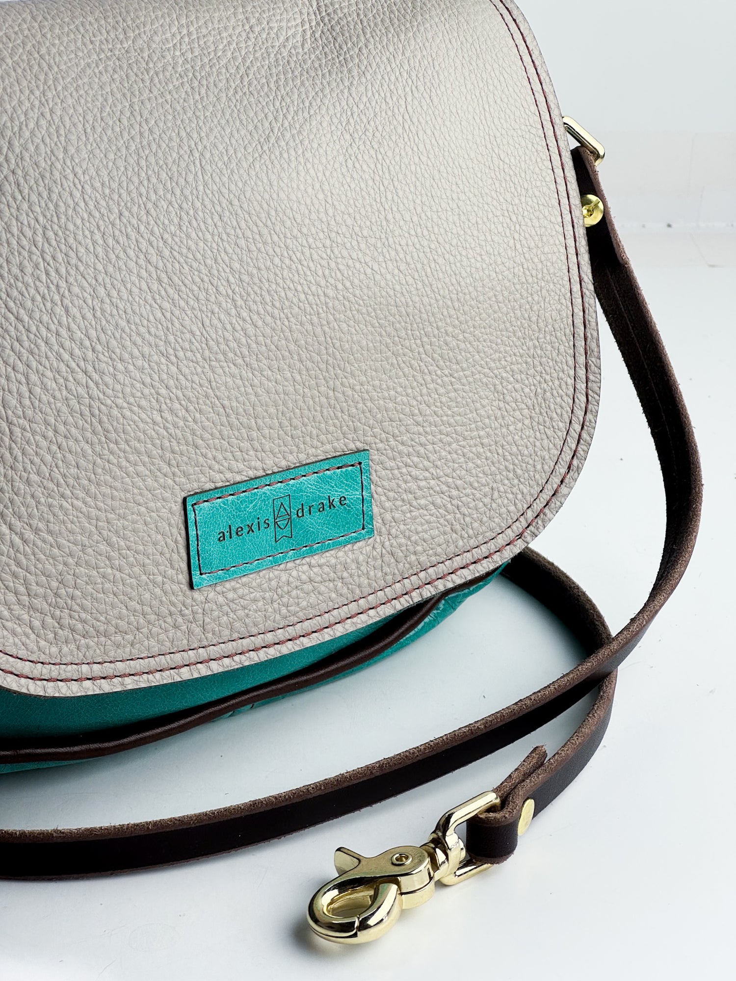 Arena Tradition Collection | Mini E Crossbody | Stone Gray + Cactus