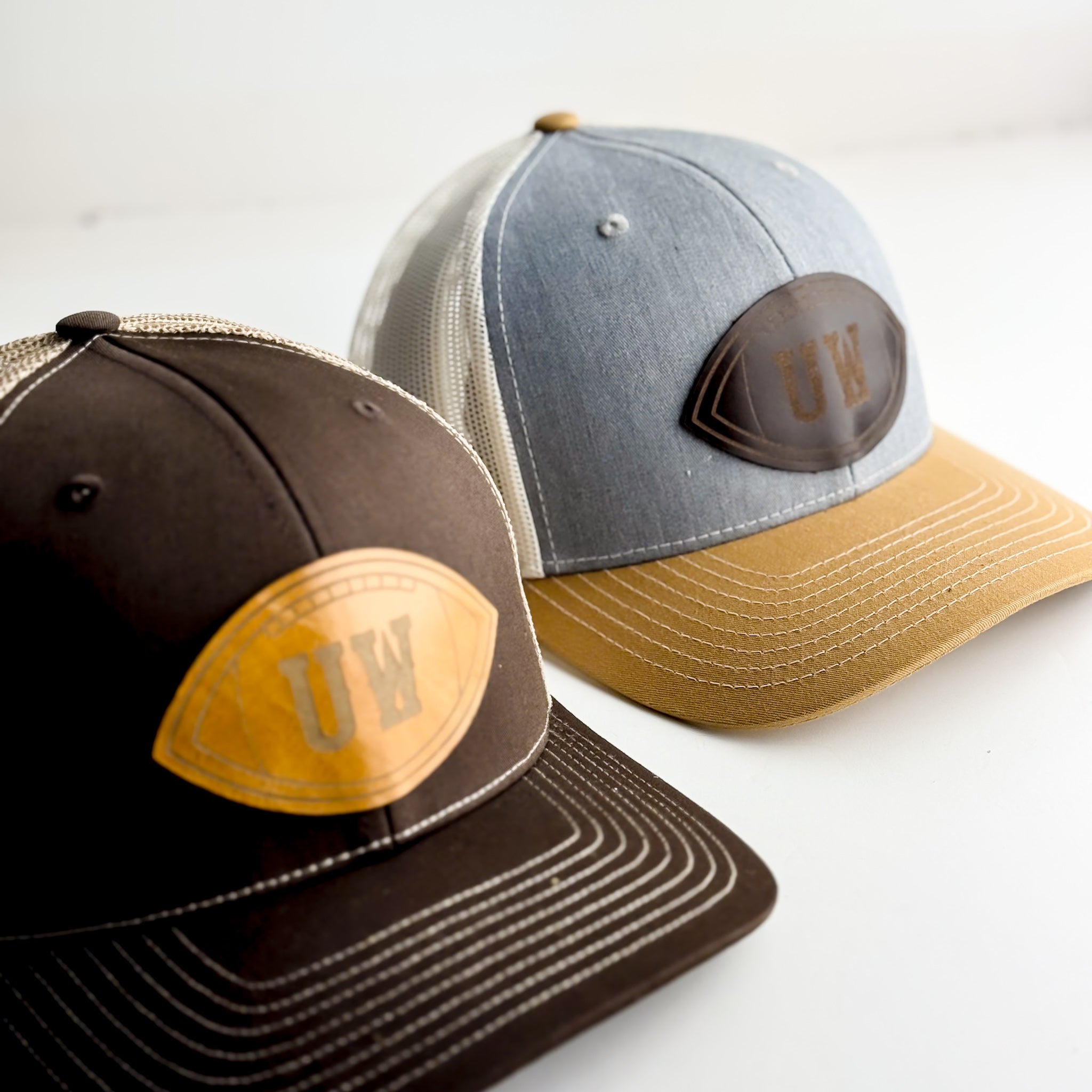 Steamboat Collection | UW Football Trucker Hat | Yellow + Rocky