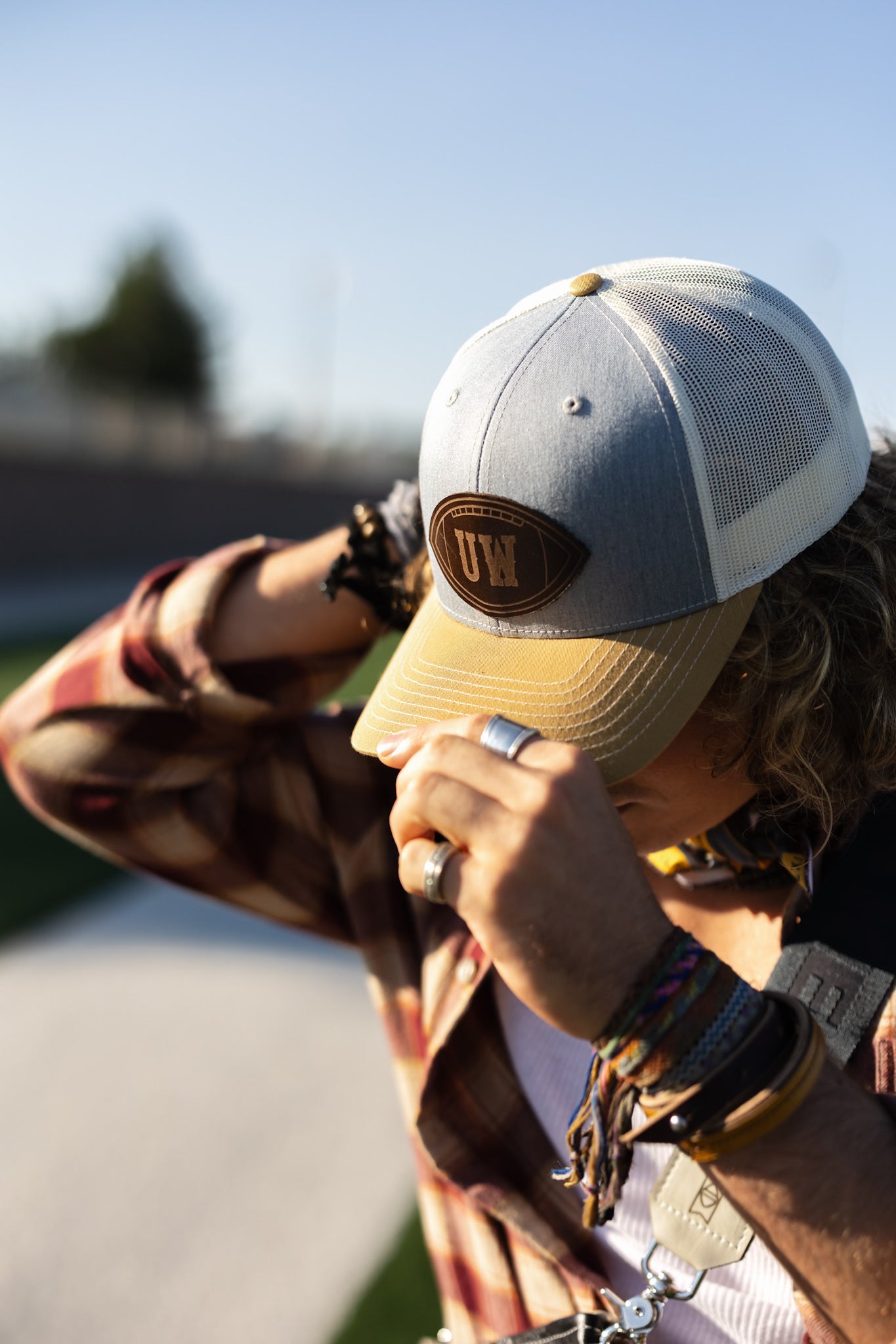 Steamboat Collection | UW Football Trucker Hat | Yellow + Rocky