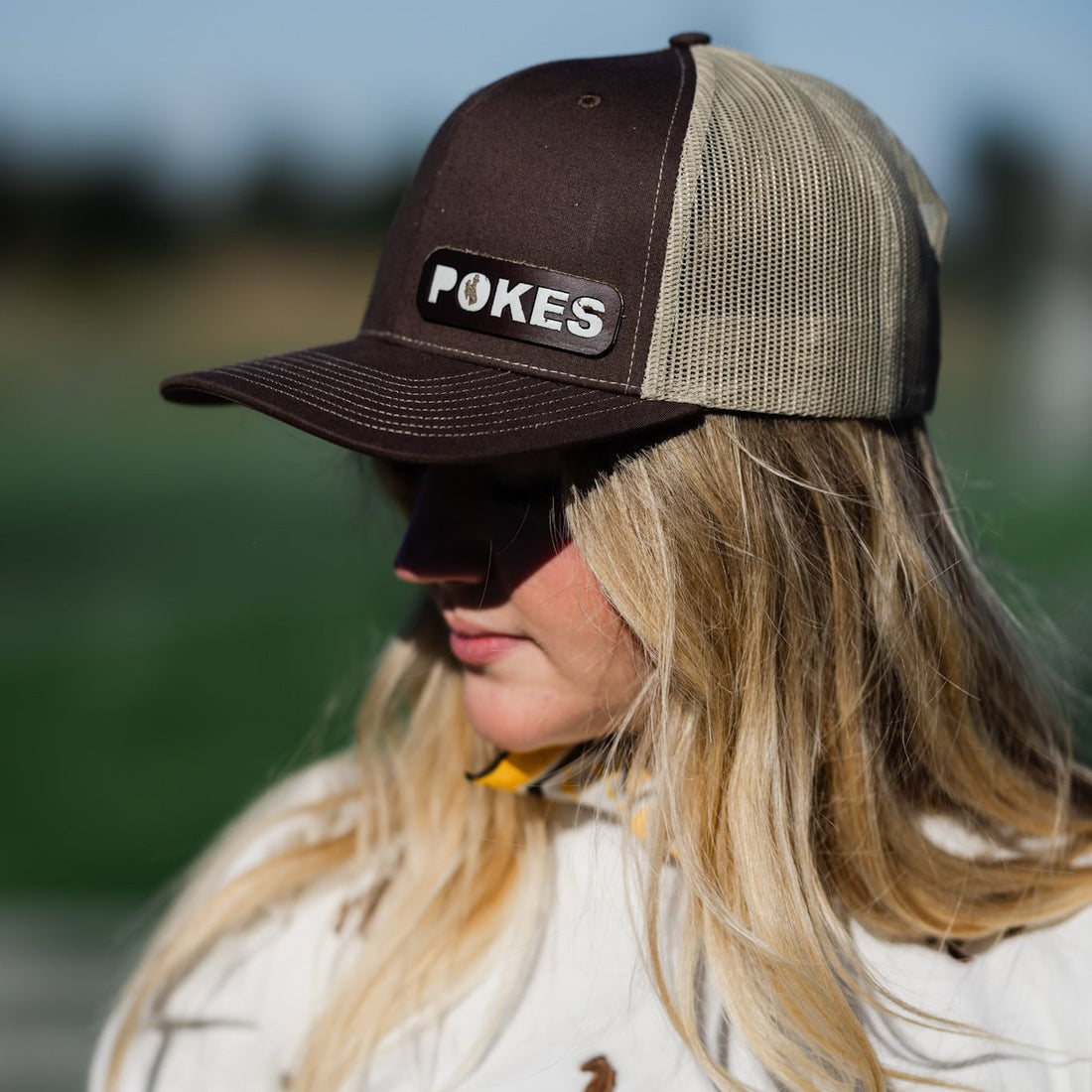 Steamboat Collection | Pokes Trucker Hat | Brown + White