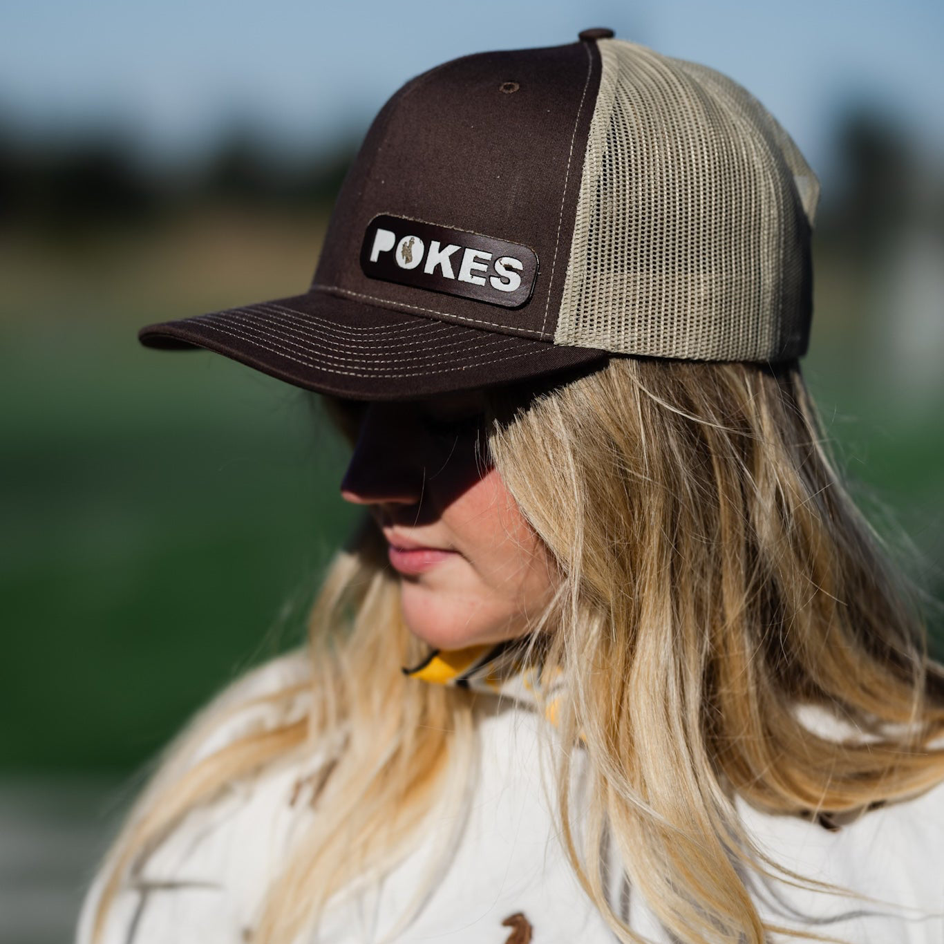 Steamboat Collection | Pokes Trucker Hat | Brown + White