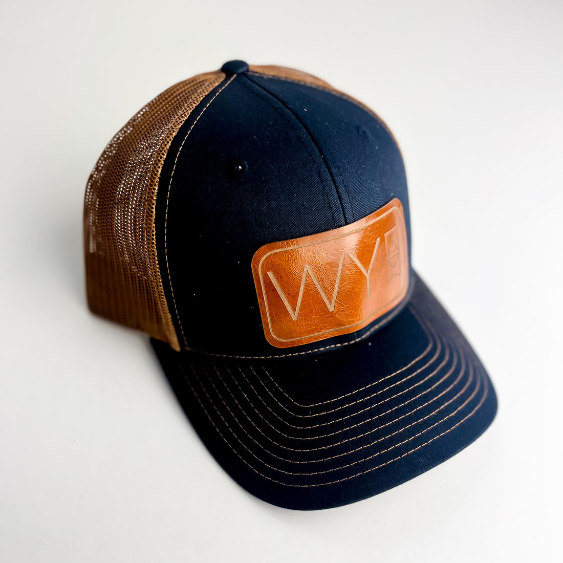WY Trucker Hat | Navy + Whiskey Patch