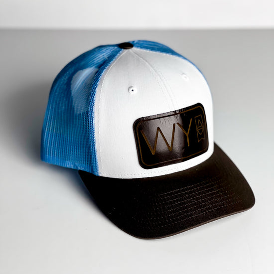 WY Trucker Hat | White + Blue
