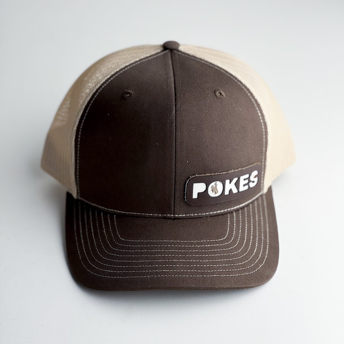Steamboat Collection | Pokes Trucker Hat | Brown + White