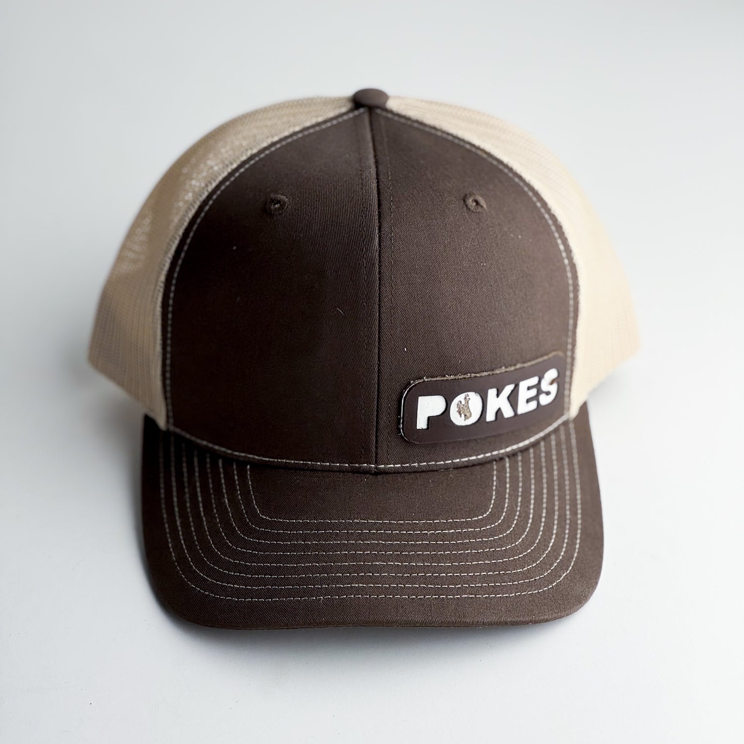 Steamboat Collection | Pokes Trucker Hat | Brown + White