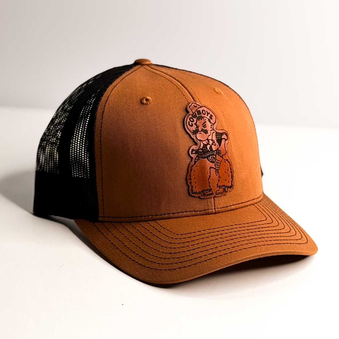 Steamboat Collection | Pistol Pete Trucker Hat | Whiskey + Black