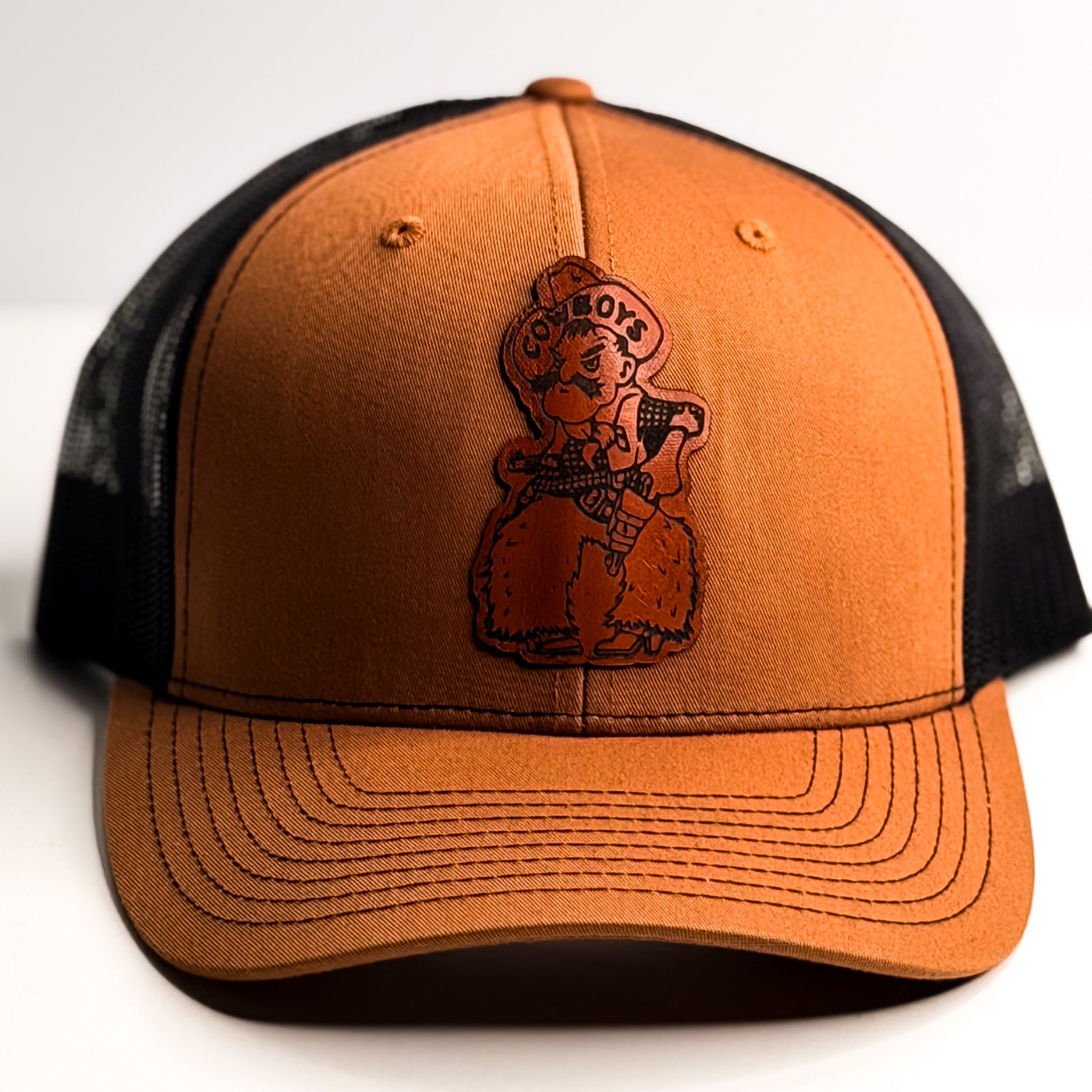 Steamboat Collection | Pistol Pete Trucker Hat | Whiskey + Black