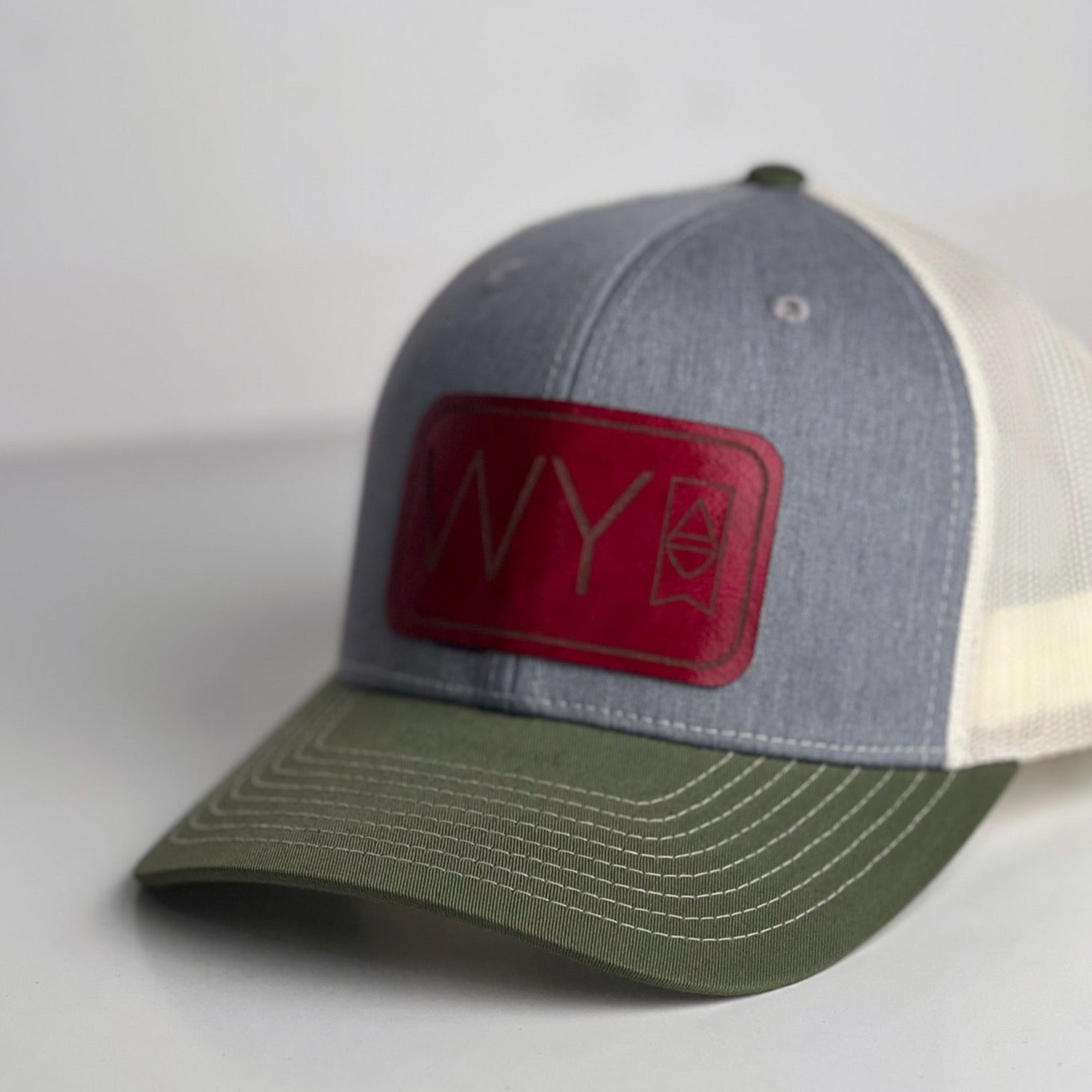 WY Trucker Hat | Olive Green + Wild Berry