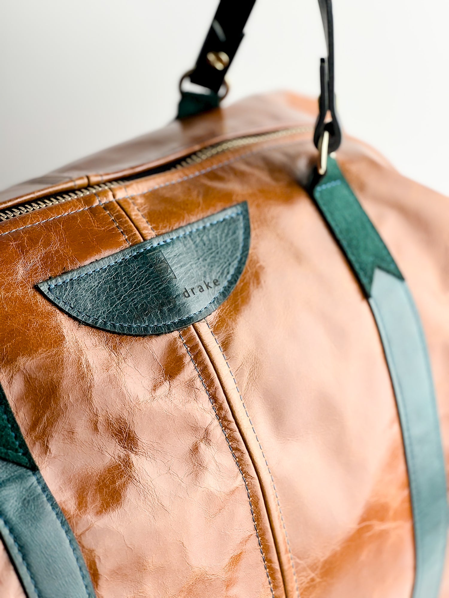 Western Woods Collection | Jackson Travel Duffel | Bourbon + Teal Spruce