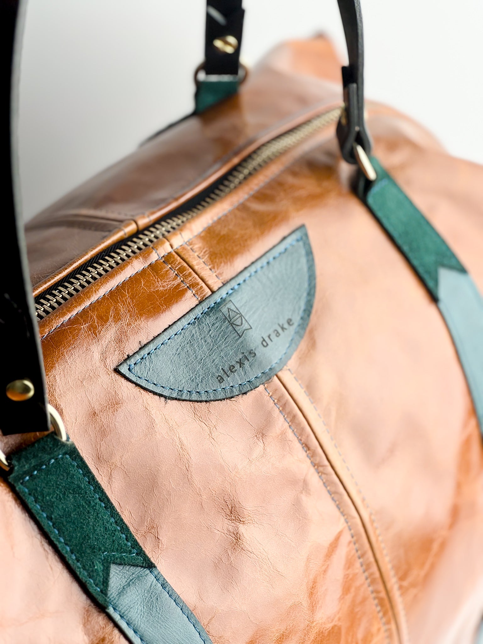 Western Woods Collection | Jackson Travel Duffel | Bourbon + Teal Spruce