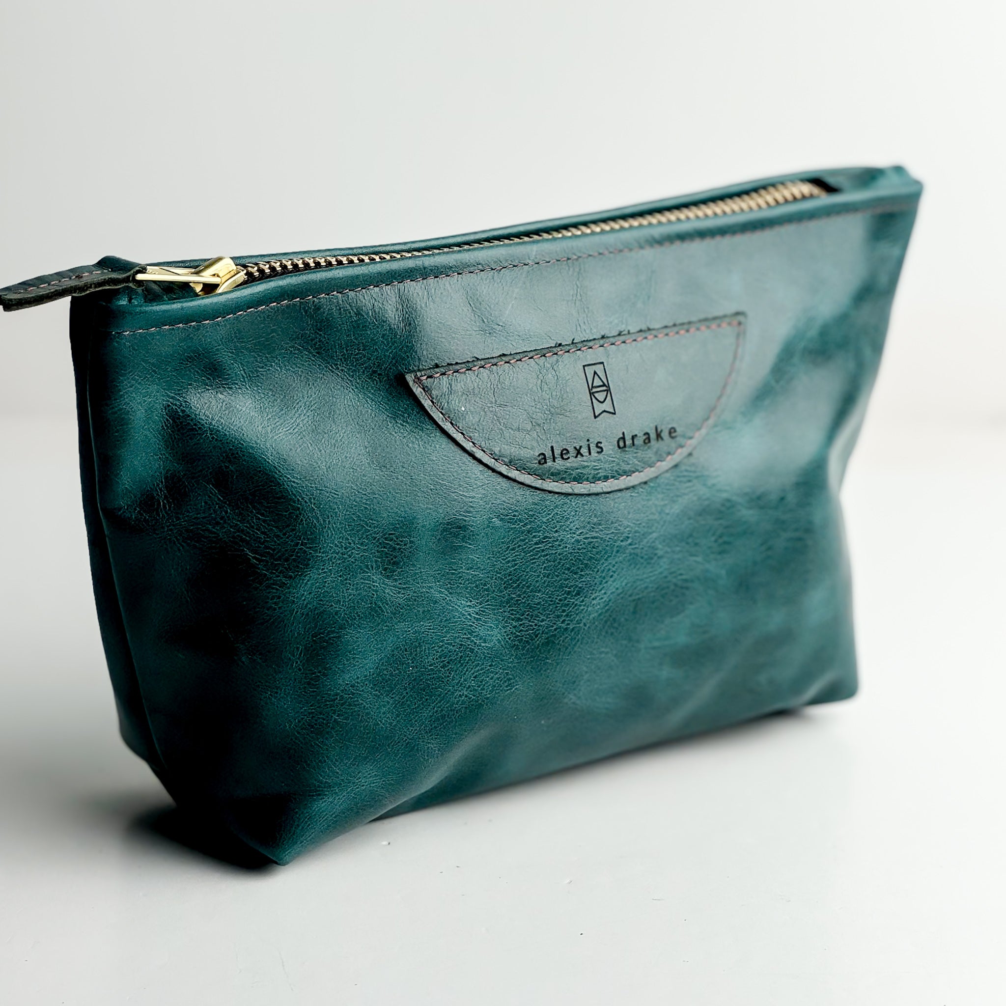 Western Woods Collection | Carry-More Clutch | Teal Spruce