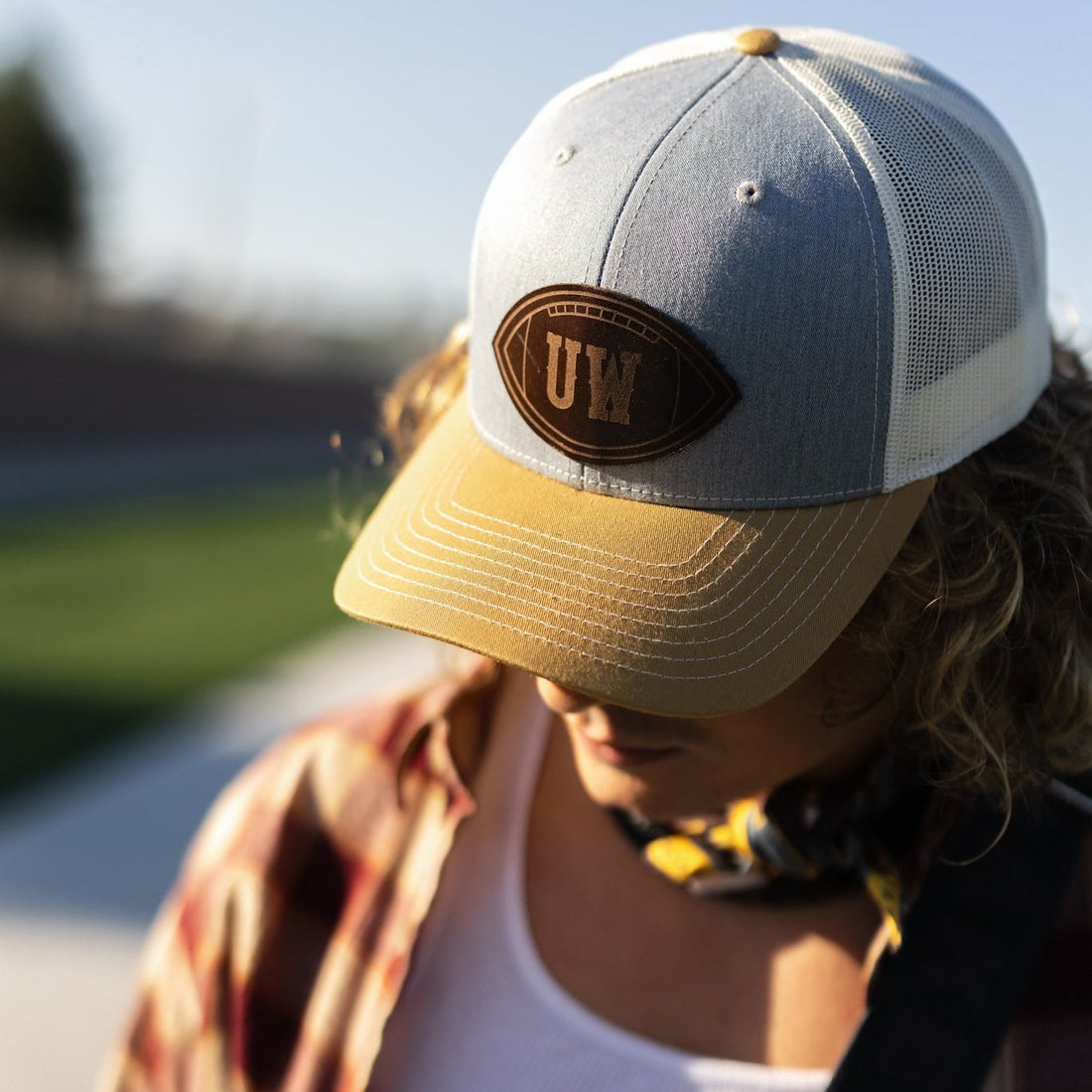 Steamboat Collection | UW Football Trucker Hat | Yellow + Rocky